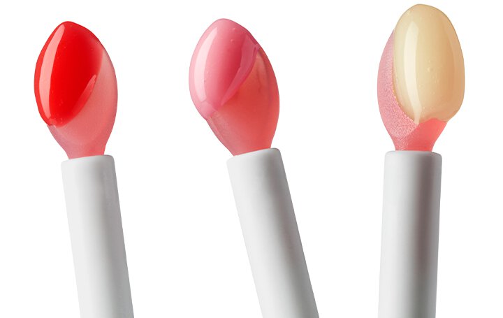 Three close-up views showcase the Laneige Lip Sleeping Mask in Strawberry Shortcake, displaying its vibrant red, pink, and light beige shades on the applicator.