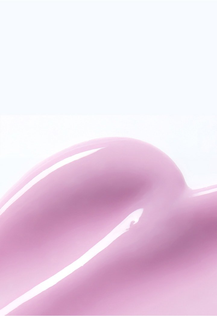The texture of the LANEIGE LIP GLOWY BALM TARO BUBBLE TEA shows off the softly spreading color for moisturized, smooth lips.