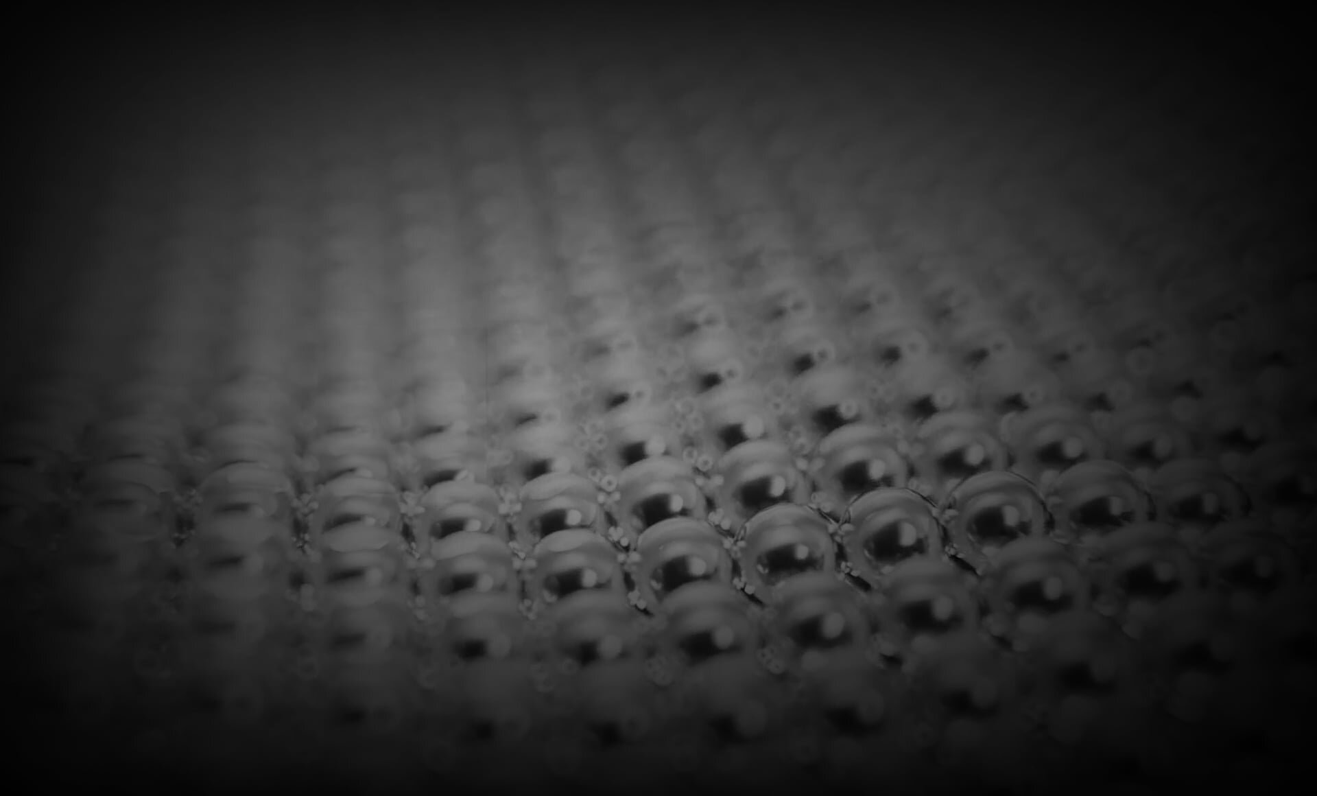 Close-up of glossy droplet-like texture pattern, symbolizing concentrated ginseng energy and skin rejuvenation technology.