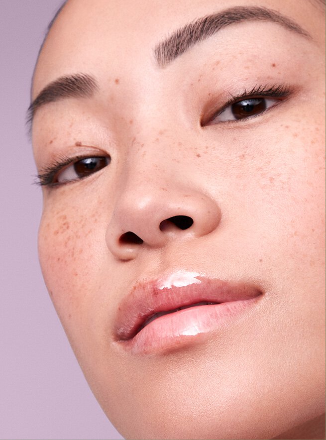 Close-up of glossy lips and even-toned skin, demonstrating the hydrating and plumping effects of Laneige Lip & Eye Sleeping Mask.